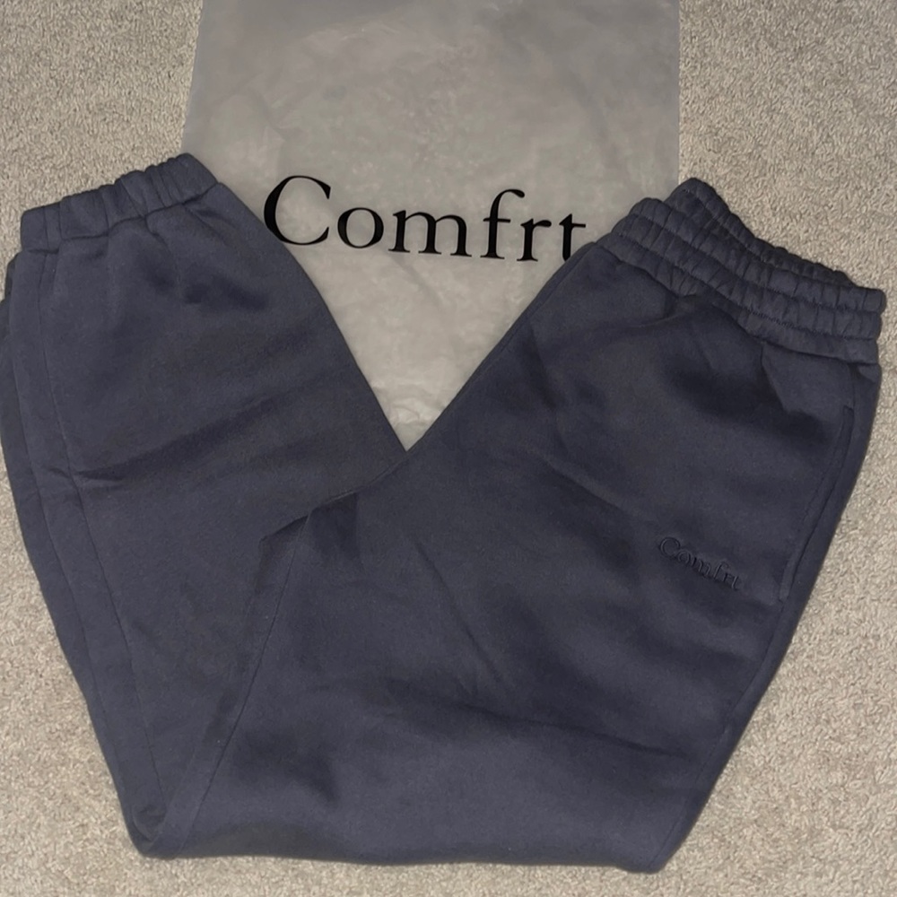 New, still in package, never worn. Both are size L. Charcoal color